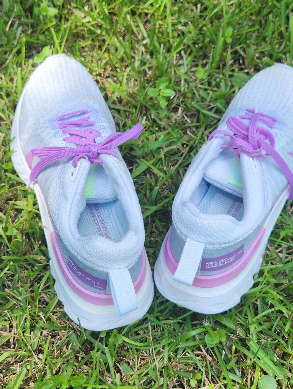 Nike Kids White Sneakers with Pink and Lavender Accents